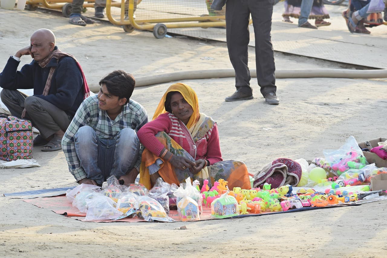 A local vendor at his stall in an Indian market